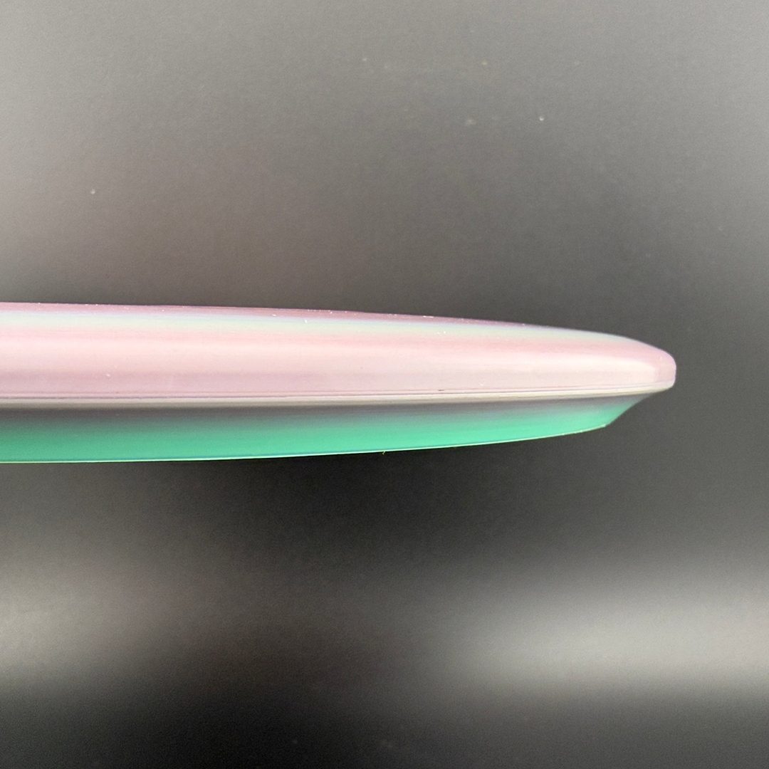 Swirly ESP Buzzz First Run - Paul McBeth 4x Claws - Salmon Grape Discraft