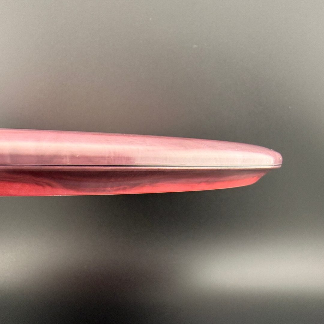 Swirly ESP Buzzz First Run - Paul McBeth 4x Claws - Pink Smoke Discraft