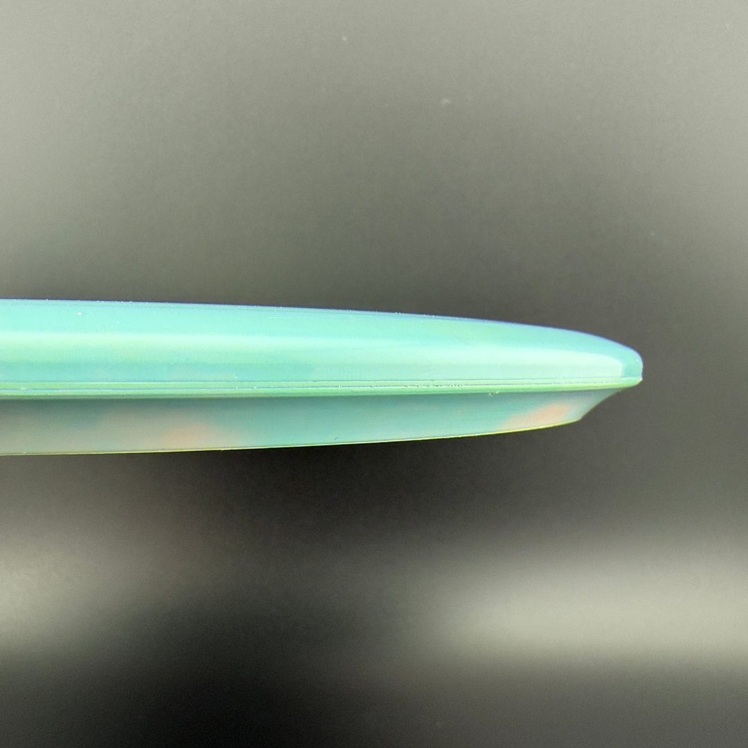 Swirly ESP Buzzz First Run - Paul McBeth 4x Claws - Teal Discraft