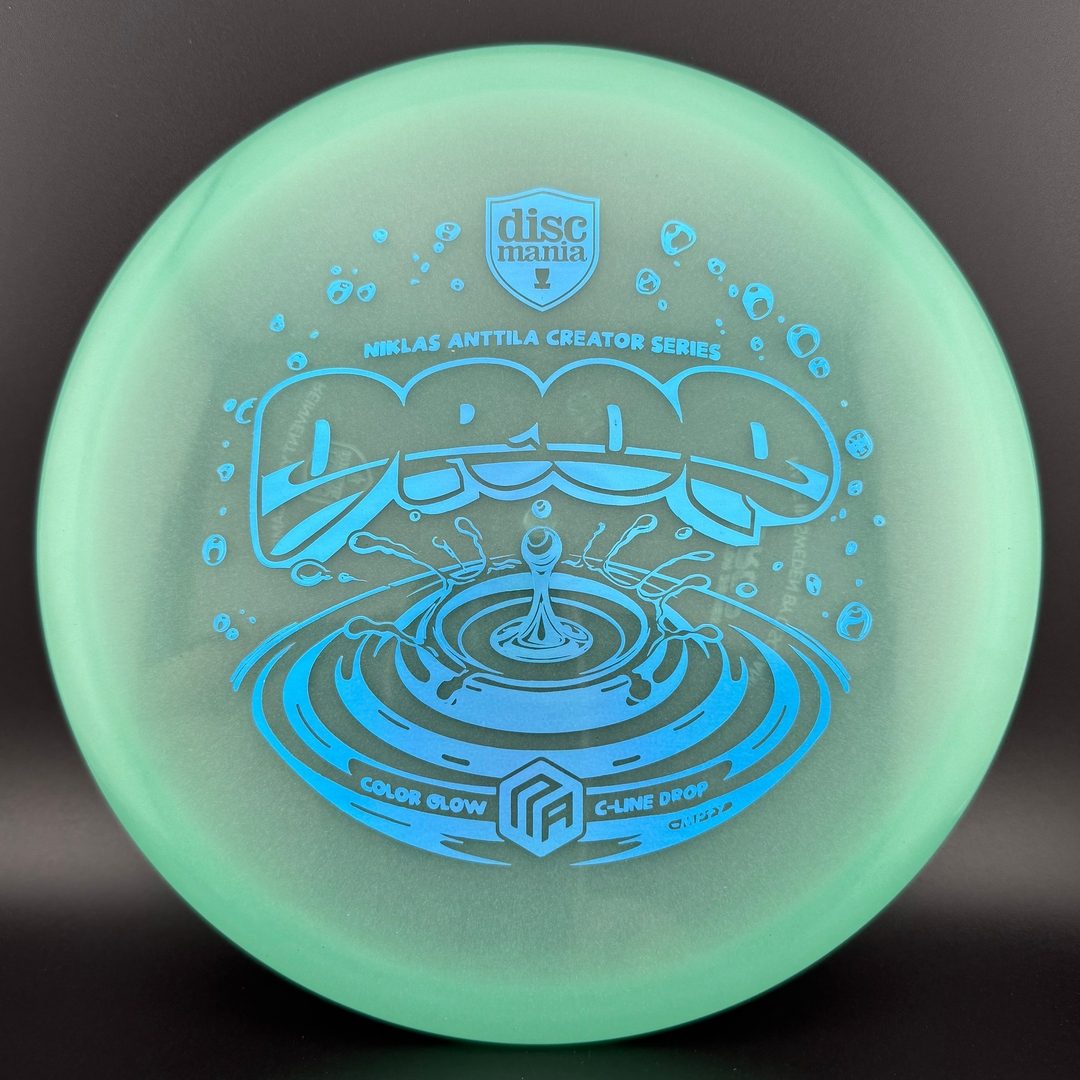 Color Glow C-Line Drop - Niklas Anttila Creator Series - Art by Manny Trujillo Discmania