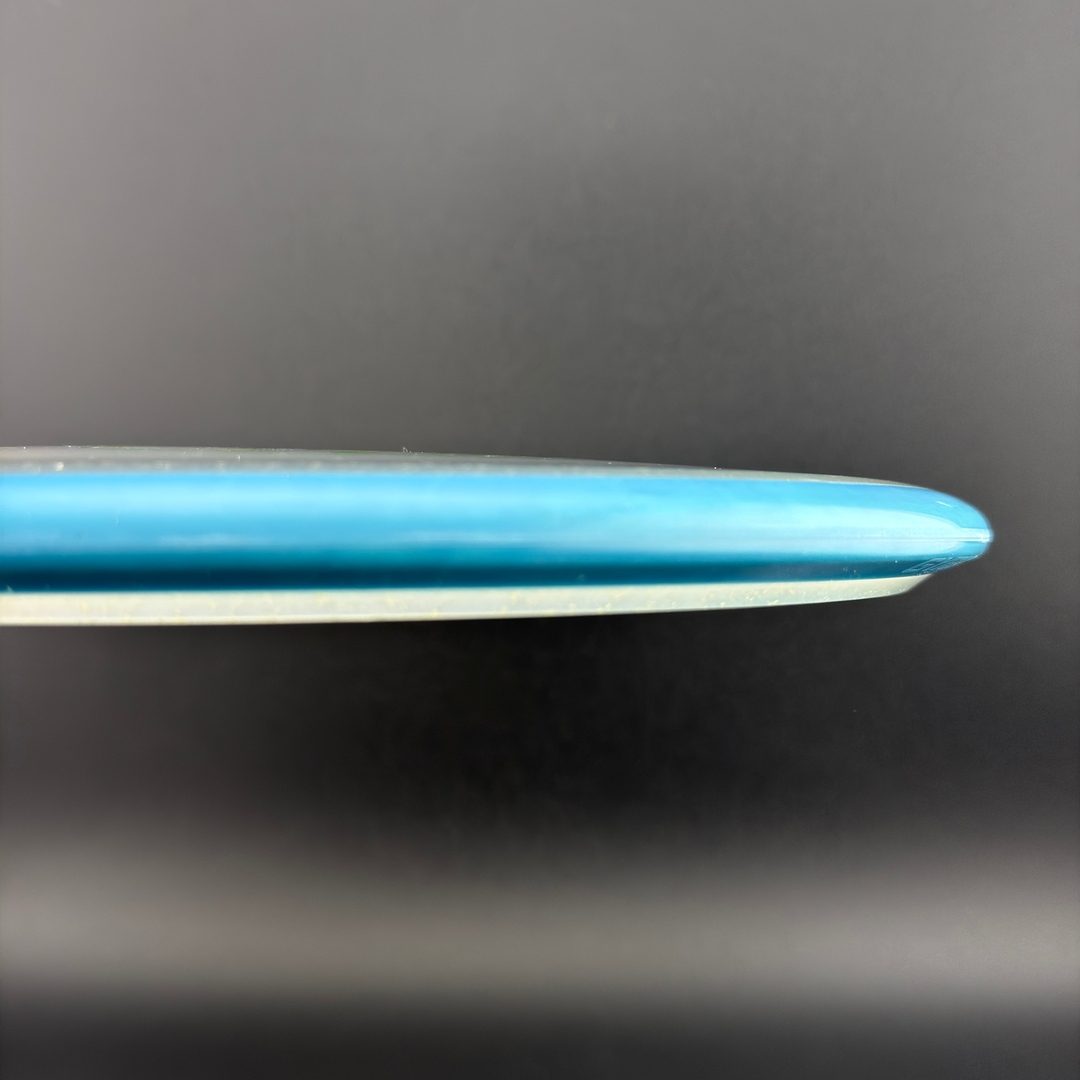 Particle Glow Soft Proton Hex - OTB Open 2026 Axiom