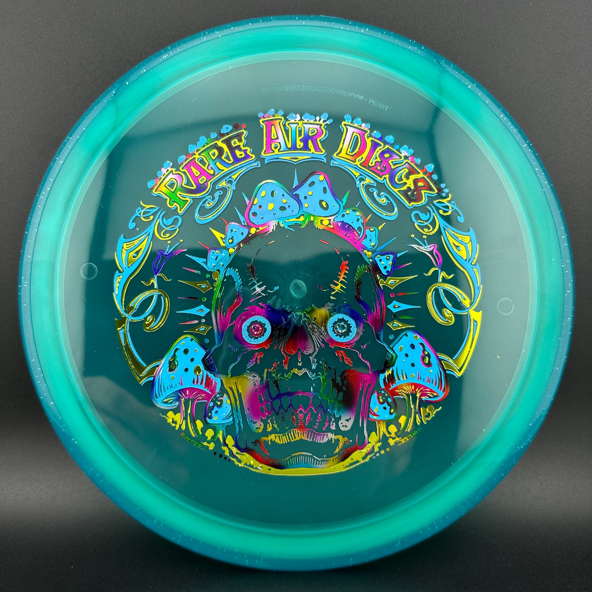 Prism Proton Pyro - Crushin' Amanitas stamp by Manny Trujillo - VIP Edition Axiom