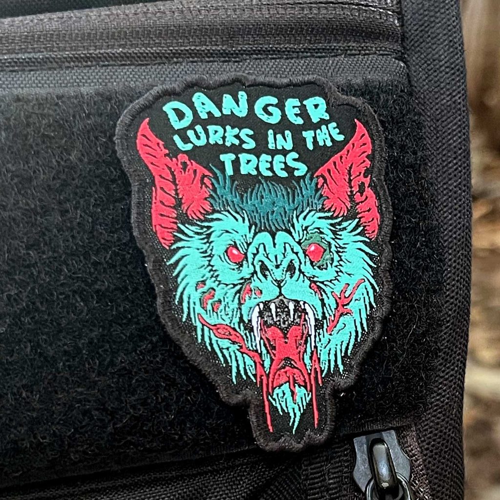 Danger Lurks In The Trees Disc Golf Patch - Hook And Loop Disc Golf Pins