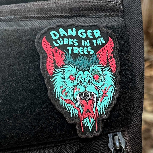 Danger Lurks In The Trees Disc Golf Patch - Hook And Loop Disc Golf Pins